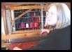 Pat Beard at loom.
