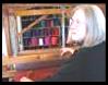 Pat Beard at weaving loom.